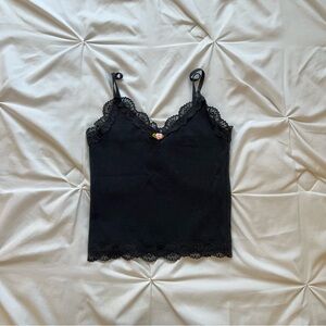 Black lace trim crop cami top with a cute pink rosette and adjustable straps